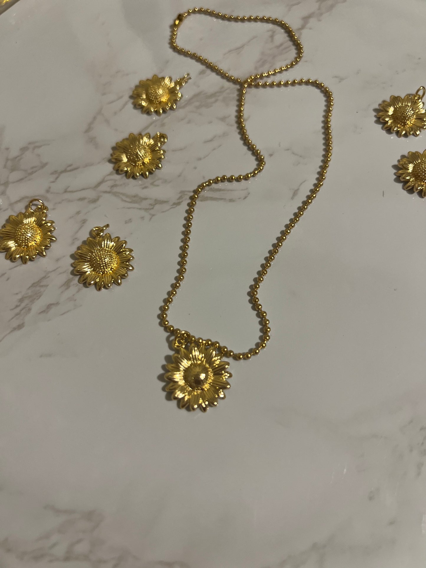 Gold sun necklace